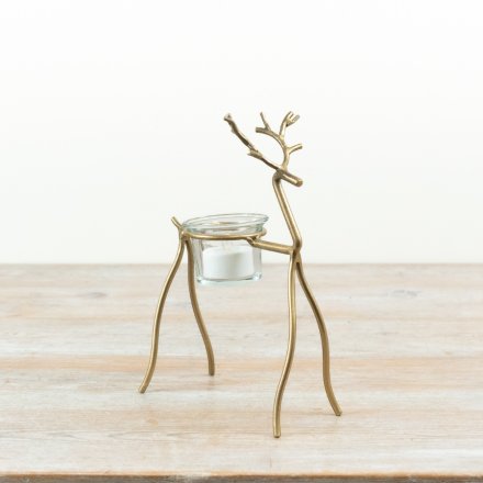 Delightful candle holder featuring a whimsical reindeer design.