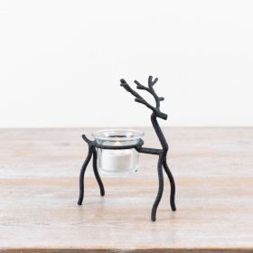 a charming black reindeer candle holder 
