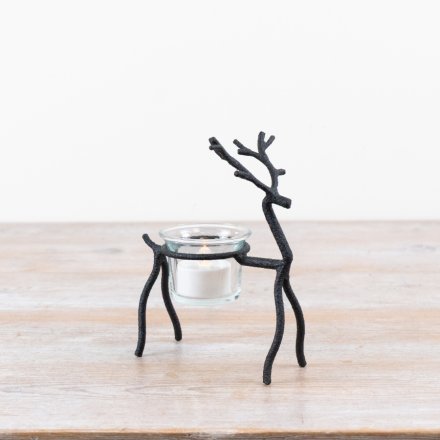 a stylish metal reindeer candle holder 