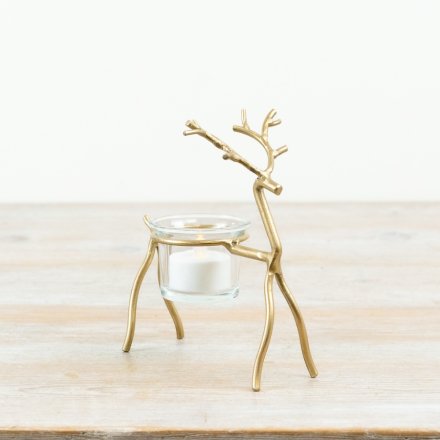 Bring holiday charm with this elegant Gold Metal Reindeer Candle Holder.