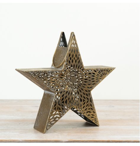 A unique star shaped candle holder with an attractive cut out pattern. Complete with handle.