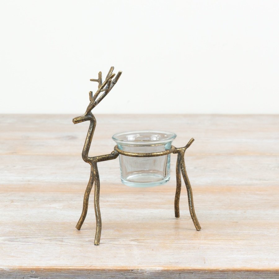 Add a touch of festive charm to seasonal displays with this elegant reindeer t-light holder