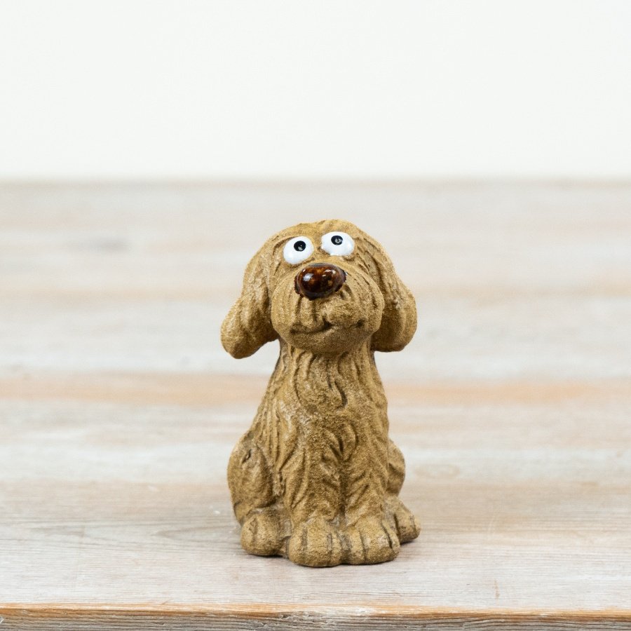 a charming sitting dog figurine 