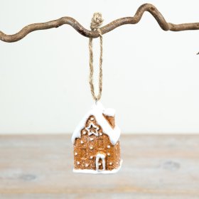 6.5cm ceramic gingerbread house hanger with classic icing details and a snowy roof design.