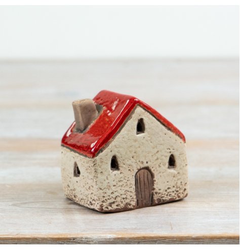 Bring cosy charm to your holiday décor with this delightful LED ceramic house.