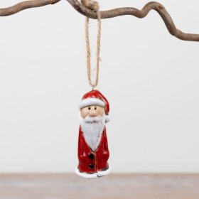 This 8cm ceramic Santa hanger showcases a classic red suit with timeless festive accents.