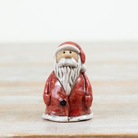 Bring timeless Christmas appeal to your range with this charming ceramic Santa ornament.