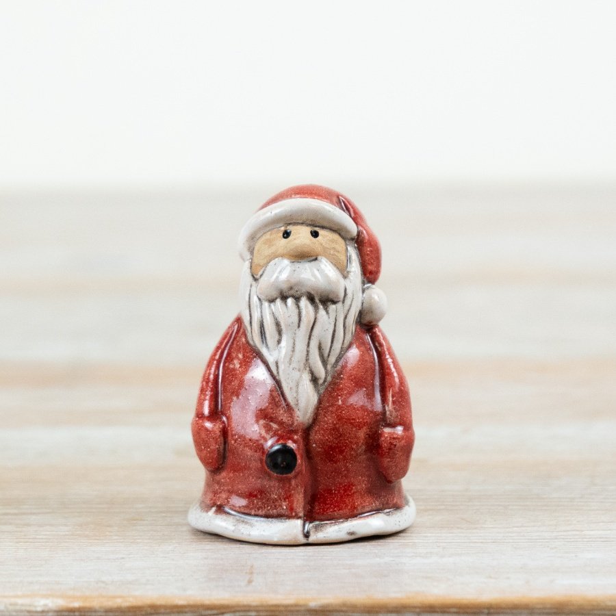 Bring timeless Christmas appeal to your range with this charming ceramic Santa ornament.