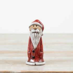 Add timeless festive appeal to your collection with this charming ceramic Santa ornament.