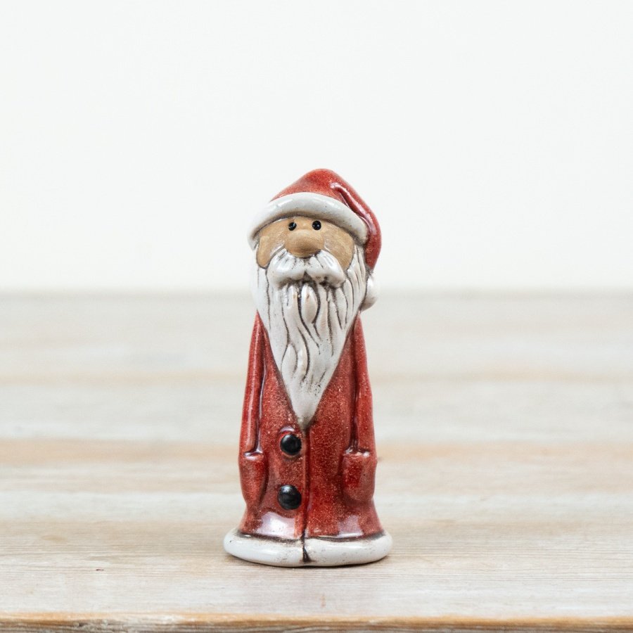 Add timeless festive appeal to your collection with this charming ceramic Santa ornament.