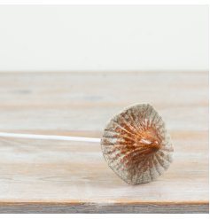 Add woodland charm to your garden with this decorative chanterelle mushroom stake.