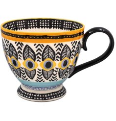 a charming yellow and black mug 