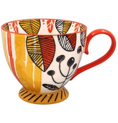 a stylish hand painted yellow and red coffee mug 