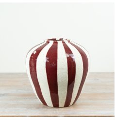 Add bold, contemporary character to your range with this eye-catching striped ceramic vase.