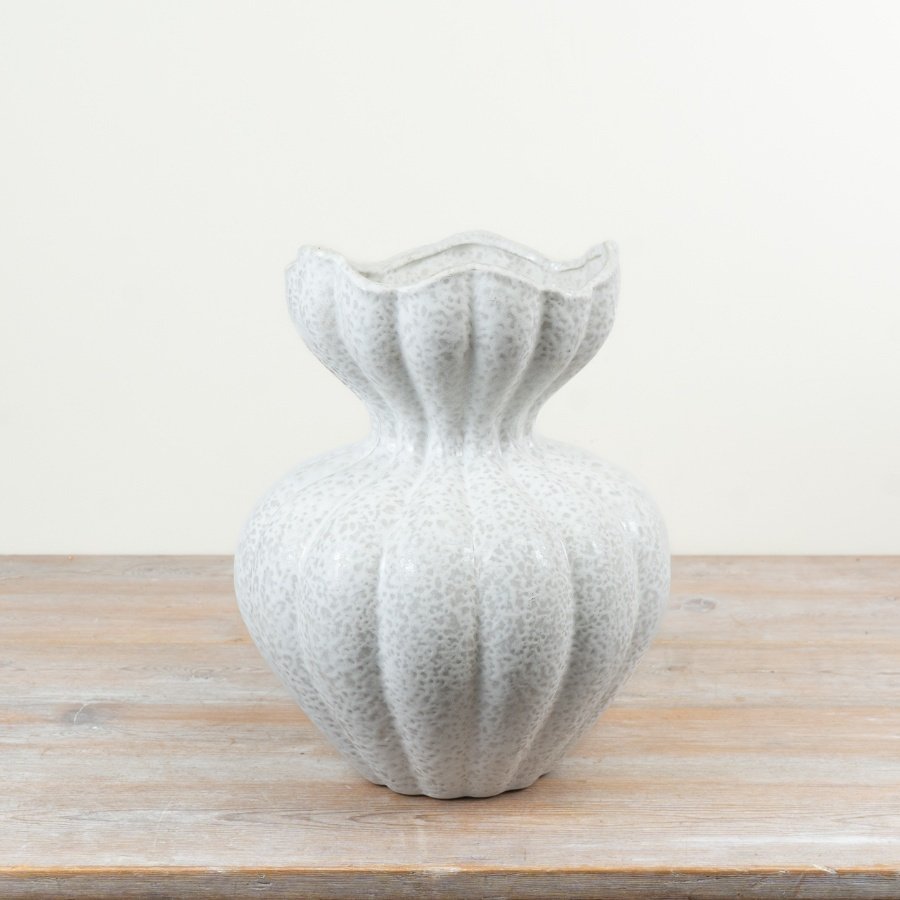 Enhance your home décor offering with this statement ceramic fluted vase