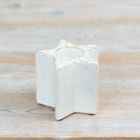 Introduce effortless, modern charm with this ceramic star t-light holder.