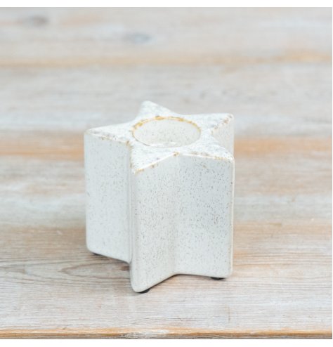 Enhance your décor with this ceramic star t-light holder, adding a touch of modern charm.