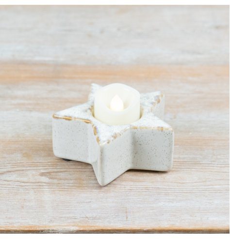 Enhance your décor with this ceramic star t-light holder for cozy, warm ambient lighting.