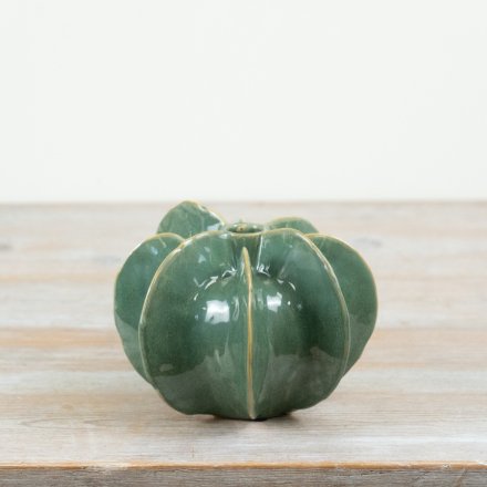 Enhance your decor with this glazed vessel vase, featuring vibrant seasonal colors.