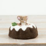 A charming felt Christmas decoration featuring a sweet mouse nestled inside a traditional iced Christmas pudding