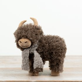 Crafted with a fluffy faux fur finish and neutral-toned scarf,