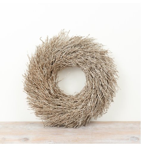 Enhance seasonal decor with this elegant twig wreath, adding natural texture and subtle charm.