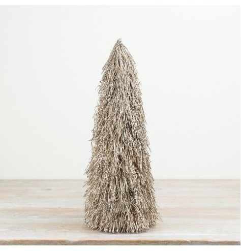 A tall decorative Christmas tree crafted in a layered twig style with a sparkling glitter finish.
