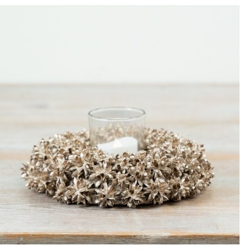 Enhance seasonal decor with this elegant candle ring, featuring subtle sparkle and natural texture.