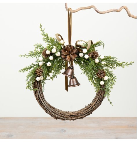 Introduce a touch of natural elegance to your festive décor with this charming rustic winter wreath