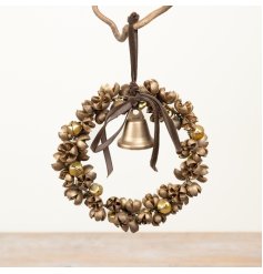 This elegant hanging wreath is formed from natural materials with a metallic gold finish