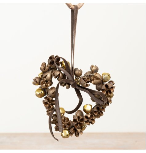 Heart-shaped hanging decor featuring clusters of antique gold jingle bells, beautifully crafted.