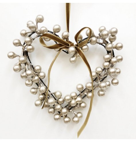 Bring festive charm and elegance to your decor with this beautifully crafted heart wreath.