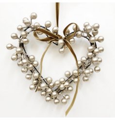 Elevate your decor with this elegant heart-shaped wreath, perfect for a festive touch.