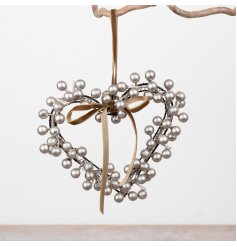 Elevate your decor with this elegant heart-shaped wreath, perfect for a festive touch.