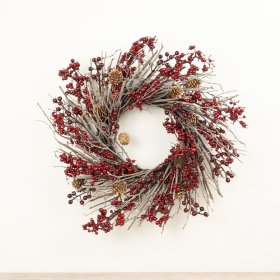 A striking seasonal wreath crafted from natural-style twigs, finished with clusters of deep red berries.