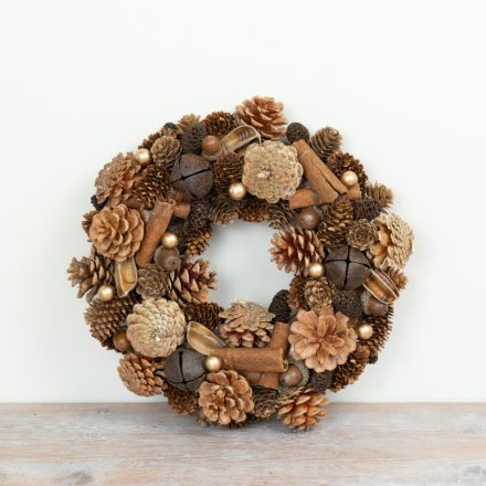 The warm earthy tones create a rustic seasonal look ideal for doors, walls or interior Christmas displays.
