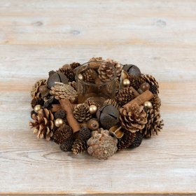 Crafted with layered pinecones, cinnamon sticks and complementary decorative elements