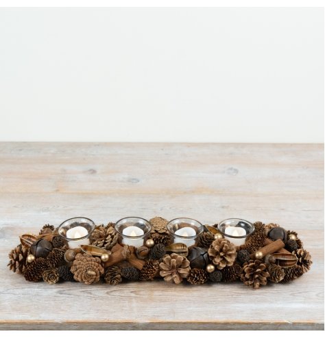 A beautifully arranged seasonal centrepiece featuring pinecones