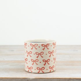 Chic glazed cement planter in delicate pink and creamy tones.