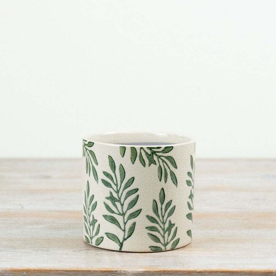 Bring new life to your space with this lovely Green Leaf Planter.