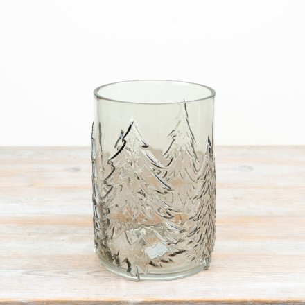  Smokey glass candle holder features embossed Christmas tree detailing that wraps around the glass,