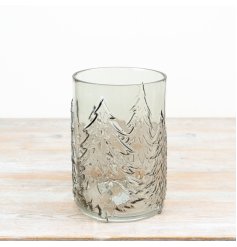 Smokey glass candle holder features embossed Christmas tree detailing that wraps around the glass,