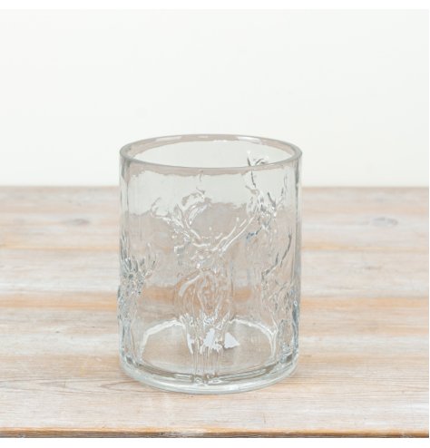 This 15cm glass candle holder showcases a refined embossed stag motif