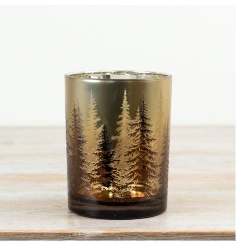 Gold finish with intricate tree design that lets candlelight shine through for a warm, glowing effect.