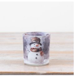 Delightful tea light holder featuring a festive snowman design