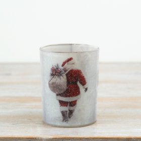 Bring a festive, nostalgic charm to your decor with this elegant glass t-light holder.