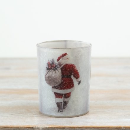 Bring festive charm to your decor with this classic decorative glass t-light holder.