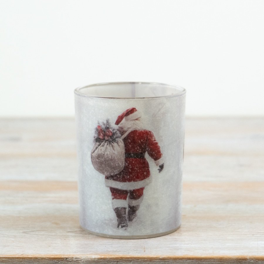 Bring a festive, nostalgic charm to your decor with this elegant glass t-light holder.