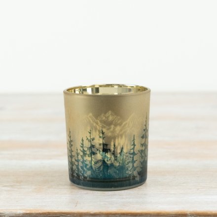 Compact tealight holder with a charming woodland design.