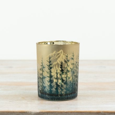 A charming tree green and gold candle holder 